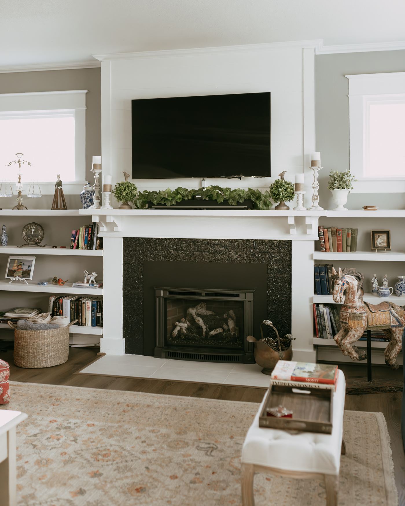 Living room after new flooring, with fireplace and built-ins